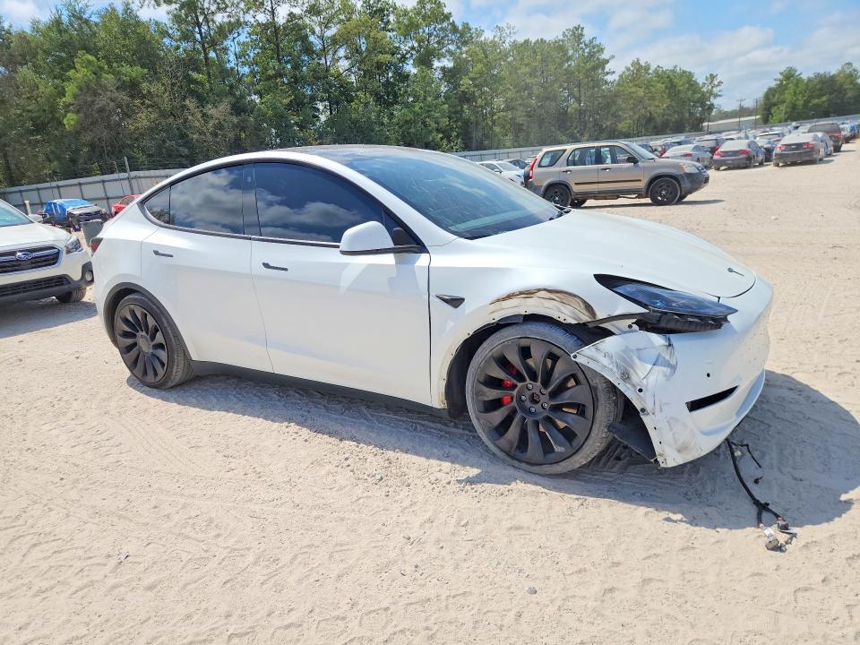 2022 Tesla Model y VIN 7SAYGDEF7NF319474 COPART salvage auction — FRONT END, FL, sold $16,200 on 2026-10-16 (photo 4)