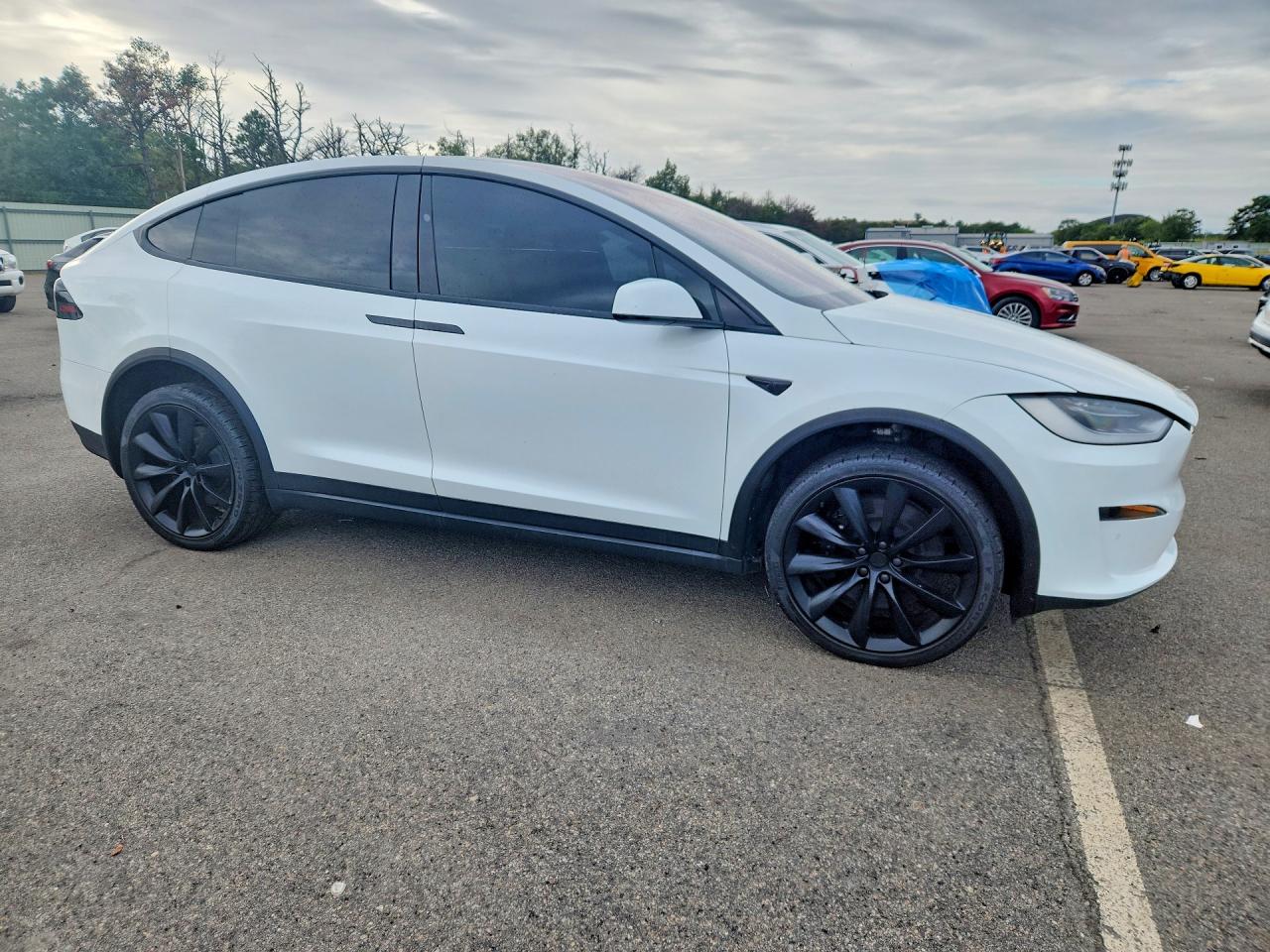 2023 Tesla Model x VIN 7SAXCDE55PF371154 COPART salvage auction — Minor Dent/Scratches, Ct - Clean Title, sold $28,250 on 2026-09-25 (photo 4)