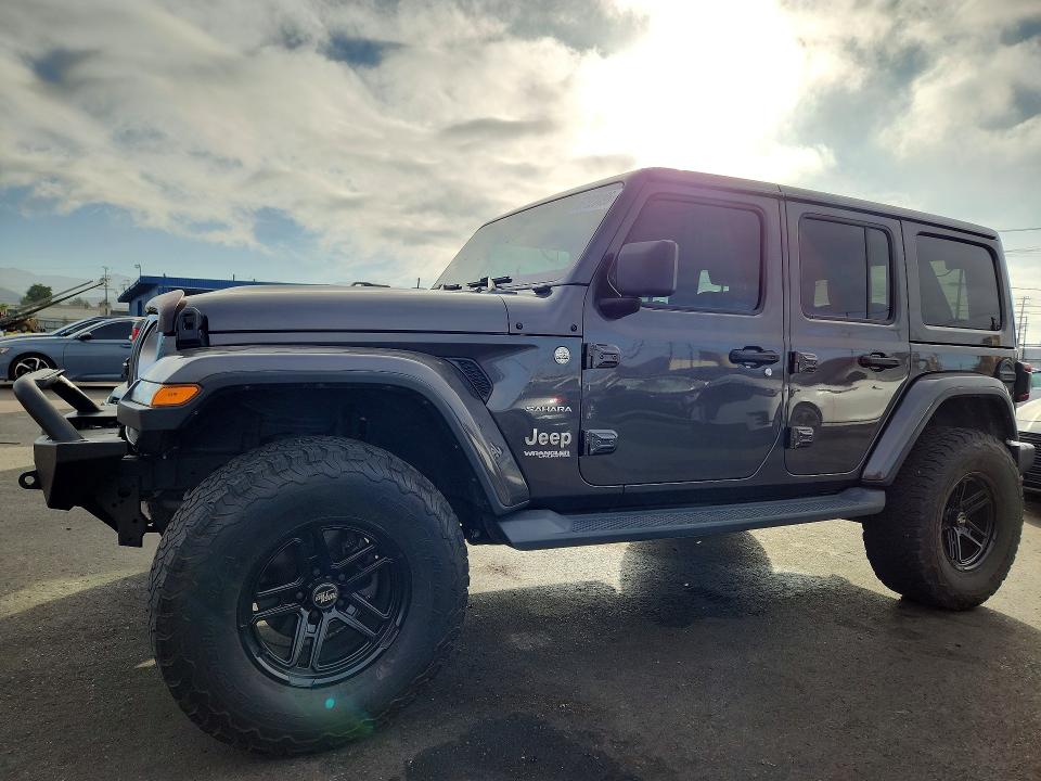 2018 Jeep Wrangler / VIN 1C4HJXENXJW255167 — COPART salvage auction photo