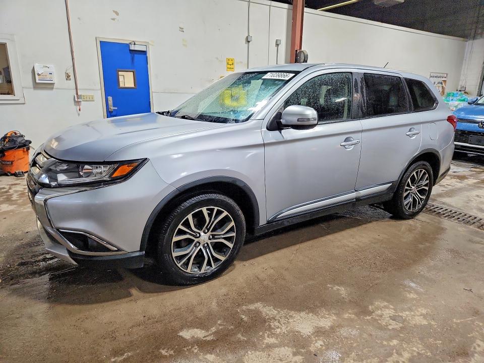 2016 Mitsubishi Outlander VIN JA4AZ3A38GZ002681 COPART salvage auction — MINOR DENT/SCRATCHES, MN, sold $625 on 2026-10-10 (photo 1)