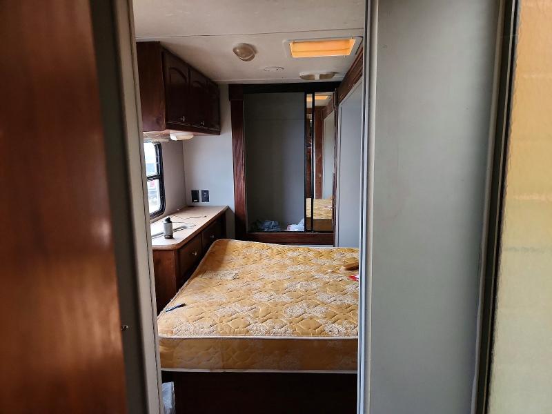 2012 Rockwood Trailers VIN 4X4TRLG25C1843700 COPART salvage auction — MINOR DENT/SCRATCHES, CA - DIS/DLR/EXP ONLY CLEAN TITLE, sold $2,300 on 2026-10-01 (photo 5)