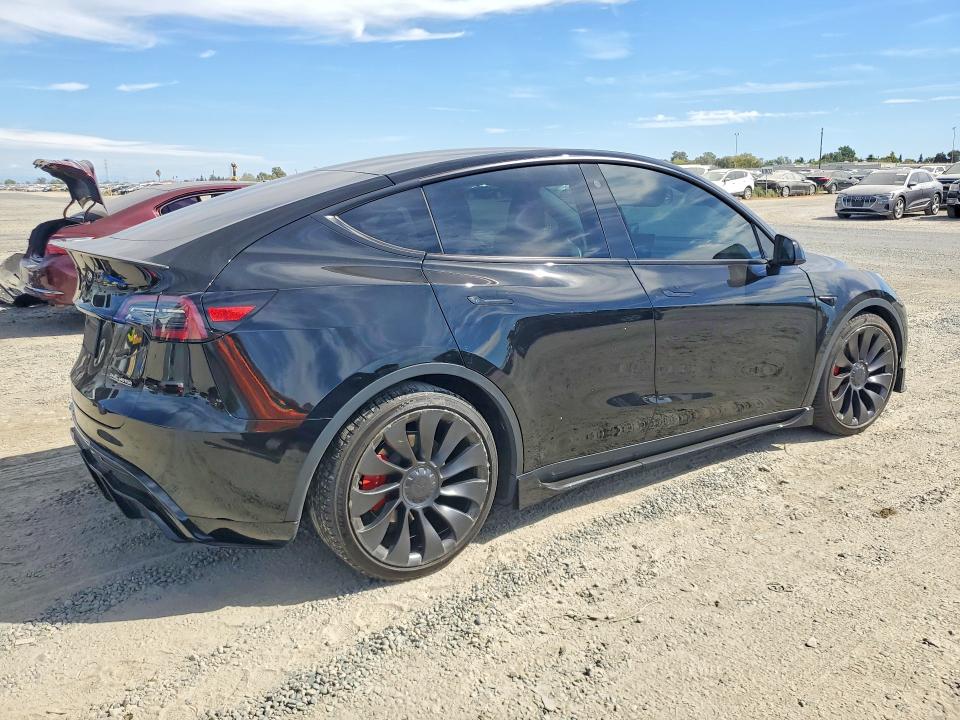 2023 Tesla Model y VIN 7SAYGDEFXPF702988 COPART salvage auction — FRONT END, Salvage Title, sold $15,600 on 2026-10-08 (photo 3)