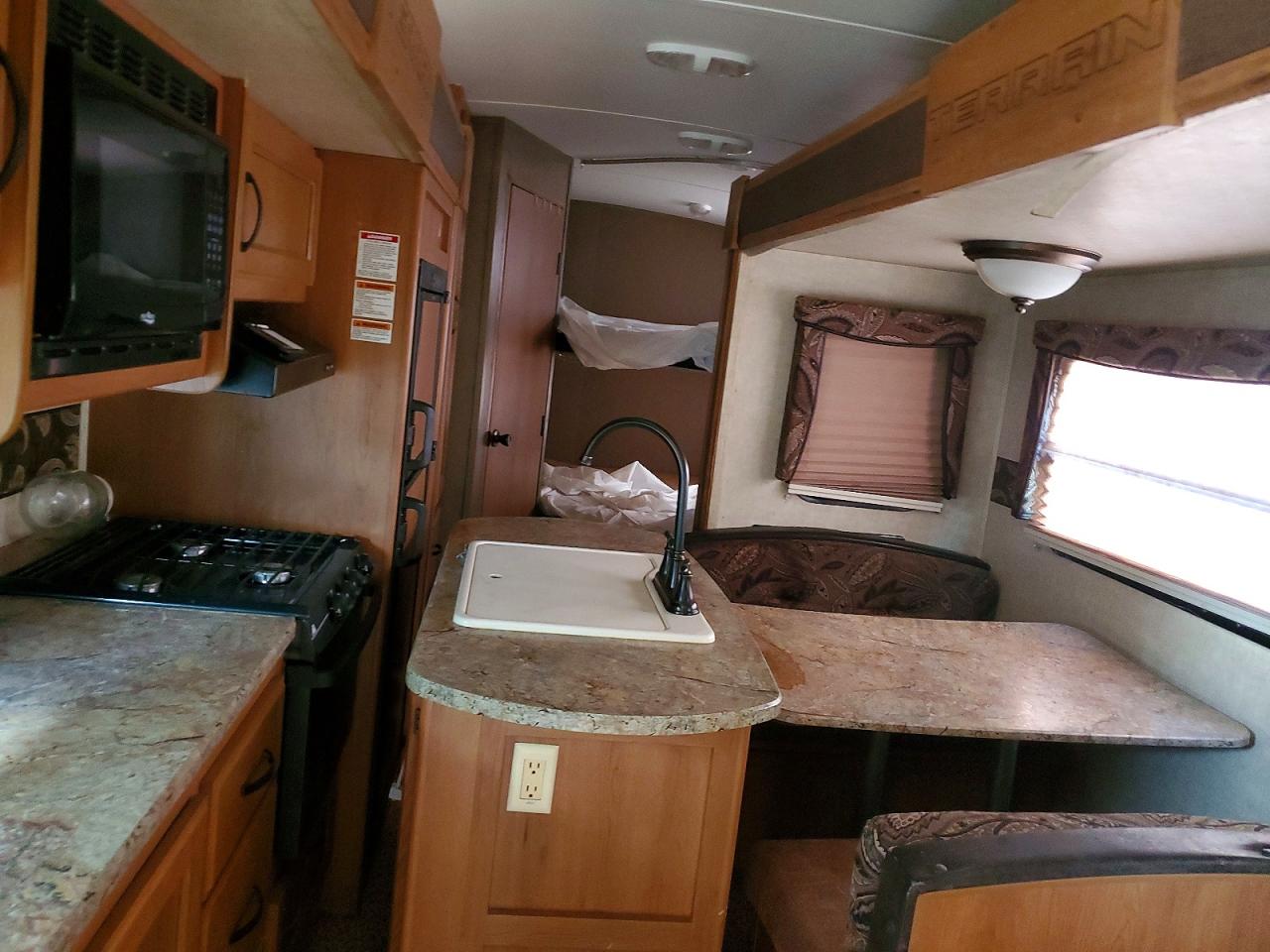 2013 Keystone Outbakloft VIN 4YDT29922DB452815 COPART salvage auction — Minor Dent/Scratches, ND - CERTIFICATE OF TITLE FOR A VEH, sold $4,250 on 2026-09-22 (photo 6)