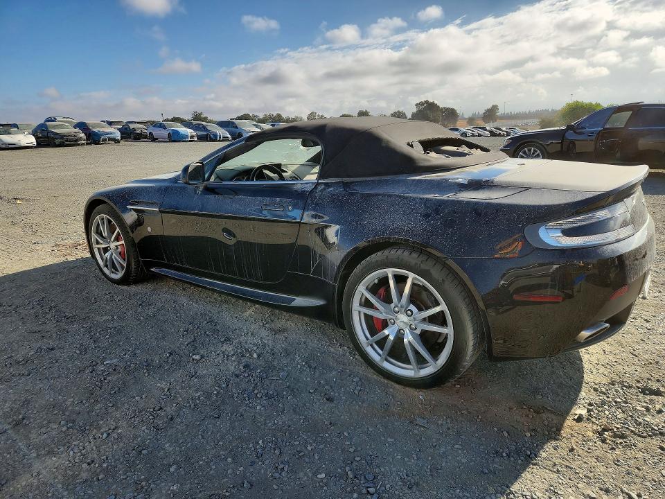 2014 Aston martin VIN SCFEKBBK0EGD18195 COPART salvage auction — VANDALISM, In - Dis/Dlr/Exp Only Clean Title (P), sold $8,900 on 2026-10-20 (photo 2)