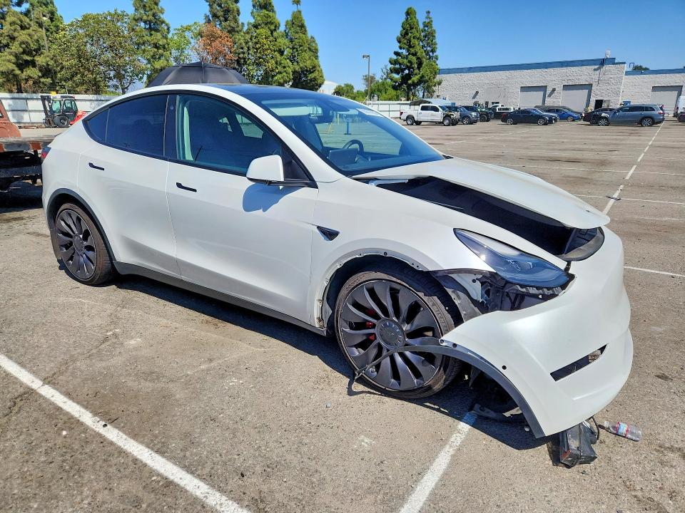 2022 Tesla Model y VIN 7SAYGDEF2NF336750 COPART salvage auction — FRONT END, Salvage Title, sold $12,000 on 2026-10-08 (photo 4)