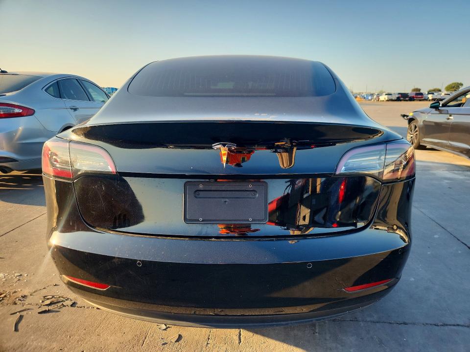2019 Tesla Model 3 VIN 5YJ3E1EA8KF406375 COPART salvage auction — NORMAL WEAR, TX - CERT OF TITLE-REBUILT SALVAGE (P), sold $6,100 on 2026-09-29 (photo 6)