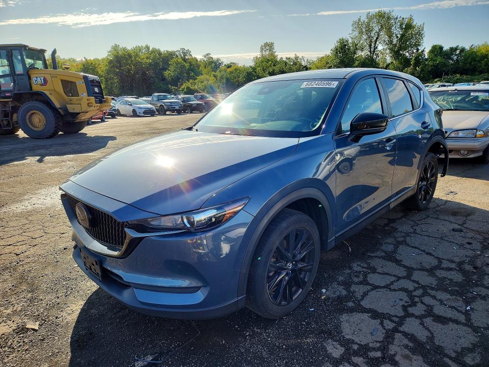 2021 Mazda Cx-5 VIN JM3KFBCM1M0412250 — COPART salvage auction photo