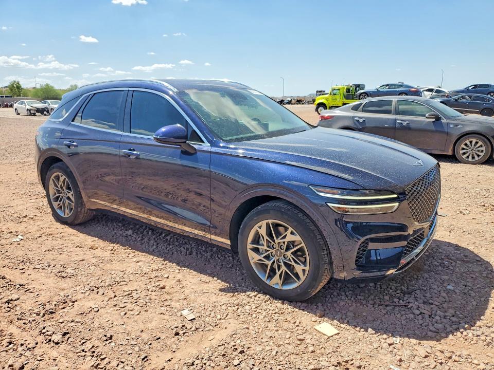 2023 Genesis Gv70 VIN KMUMADTB7PU105184 COPART salvage auction — WATER/FLOOD, AZ - CERT OF TITLE - SALVAGE, sold $18,500 on 2026-09-29 (photo 4)