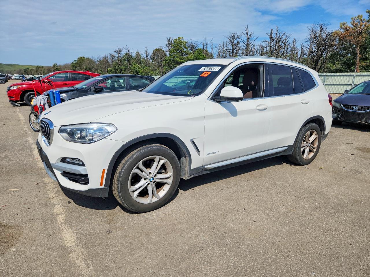 2018 BMW X3 VIN 5UXTR9C59JLD60657 — COPART salvage auction photo