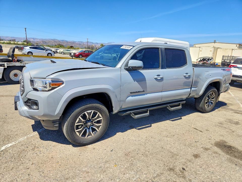 2021 Toyota Tacoma VIN 3TMDZ5BN1MM100754 — COPART salvage auction photo