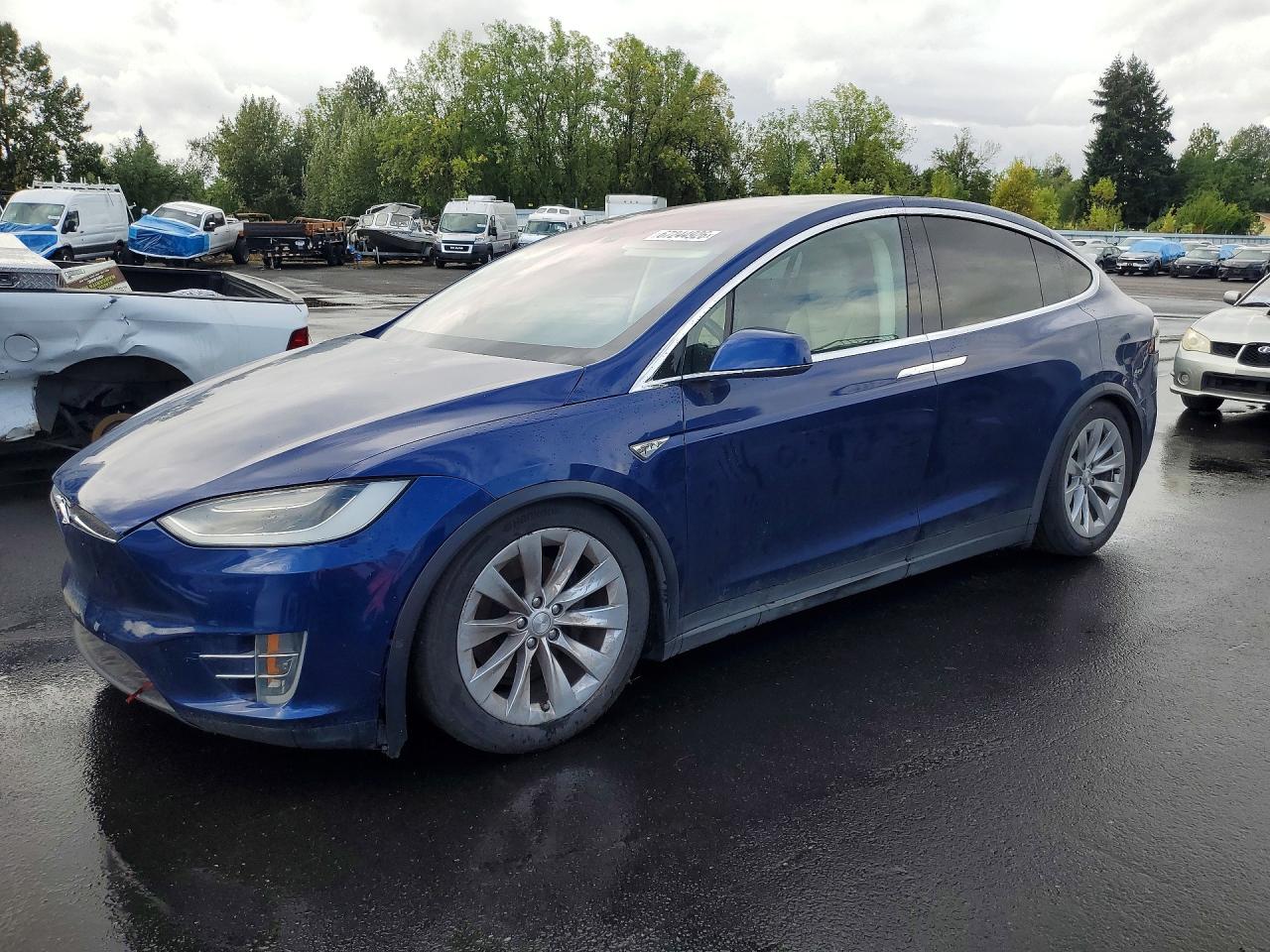 2016 Tesla Model X VIN 5YJXCAE29GF007143 — COPART salvage auction photo