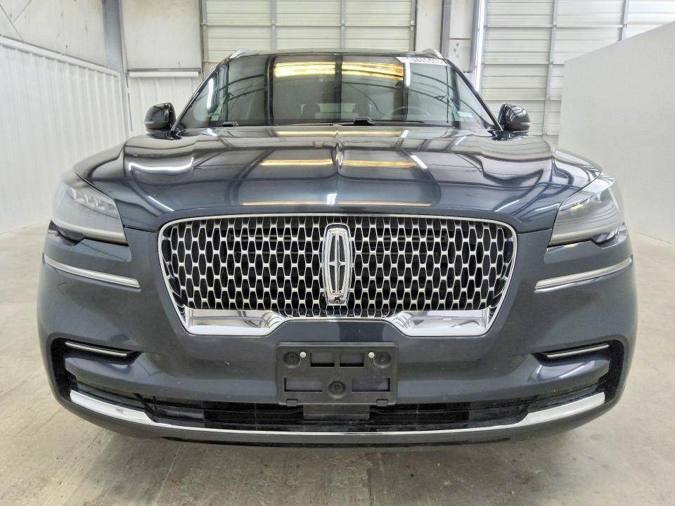 2023 Lincoln Aviator VIN 5LM5J7WC1PGL04865 COPART salvage auction — NORMAL WEAR, Tx - Certificate Of Title, sold $0 on 2026-09-16 (photo 5)