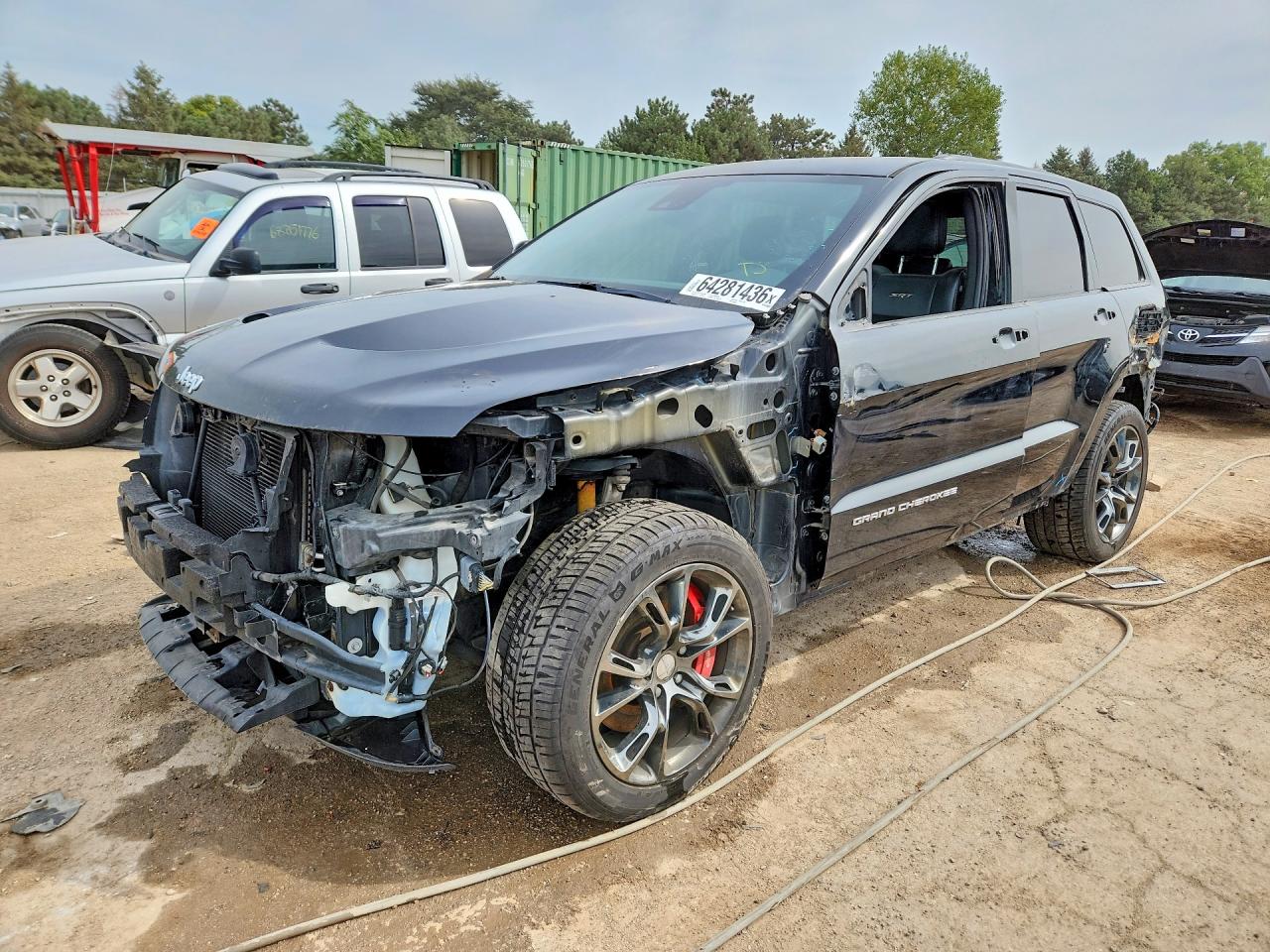 2016 Jeep Grand Cherokee VIN 1C4RJFDJ2GC399335 — COPART salvage auction photo