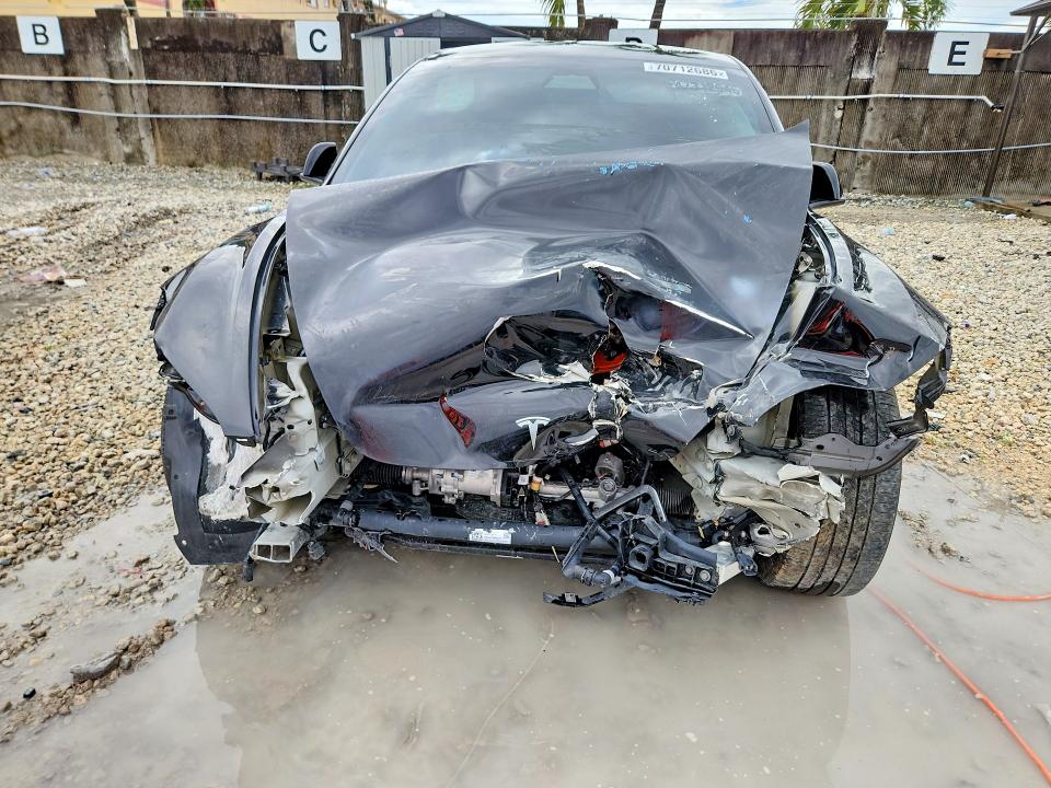 2025 Tesla Model 3 VIN 5YJ3E1EA0SF981117 COPART salvage auction — FRONT END, FL - CERT OF TITLE SLVG REBUILDABLE, sold $6,200 on 2026-10-06 (photo 5)