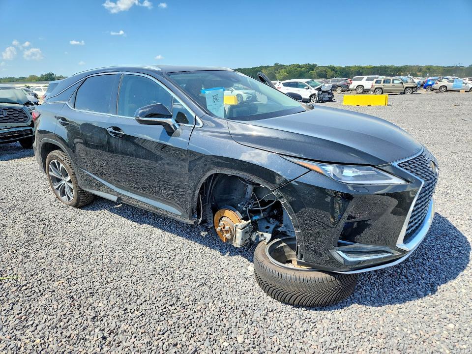 2022 Lexus Rx VIN 2T2HZMDA7NC353086 COPART salvage auction — SIDE, KS - CERT OF TITLE-SALVAGE, sold $28,500 on 2026-10-01 (photo 4)