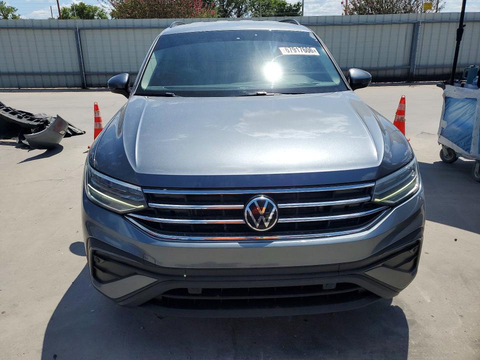 2023 Volkswagen Tiguan VIN 3VVFB7AX8PM078902 COPART salvage auction — MINOR DENT/SCRATCHES, Tx - Cert Of Title-Rebuilt Salvage, sold $3,650 on 2026-09-14 (photo 5)