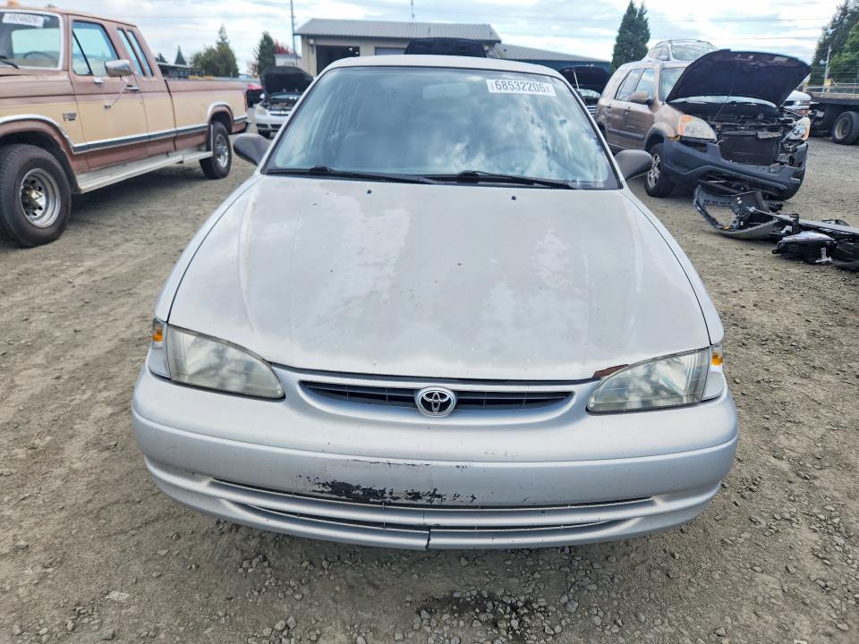 2000 Toyt Corolla VIN 1NXBR12E9YZ365600 COPART salvage auction — MINOR DENT/SCRATCHES, OR - CERTIFICATE OF TITLE, sold $175 on 2026-09-29 (photo 5)