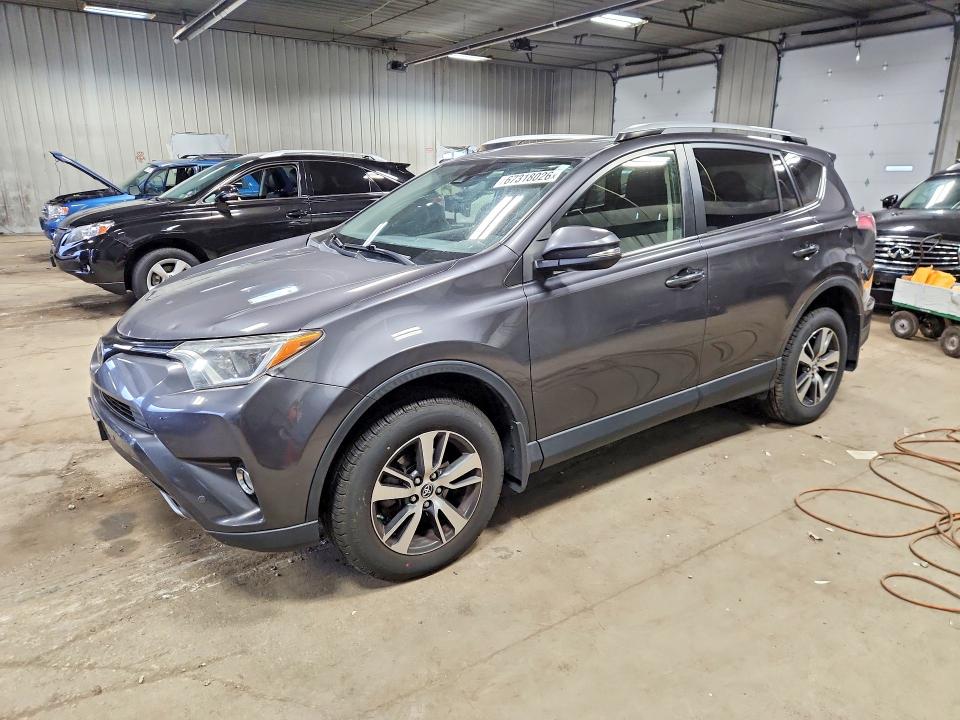 2018 Toyota Rav 4 VIN JTMRFREV0JJ261395 — COPART salvage auction photo