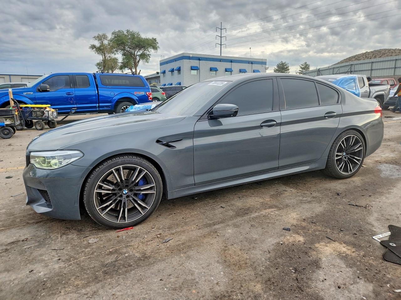 2019 BMW M5 VIN WBSJF0C59KB285517 — COPART salvage auction photo