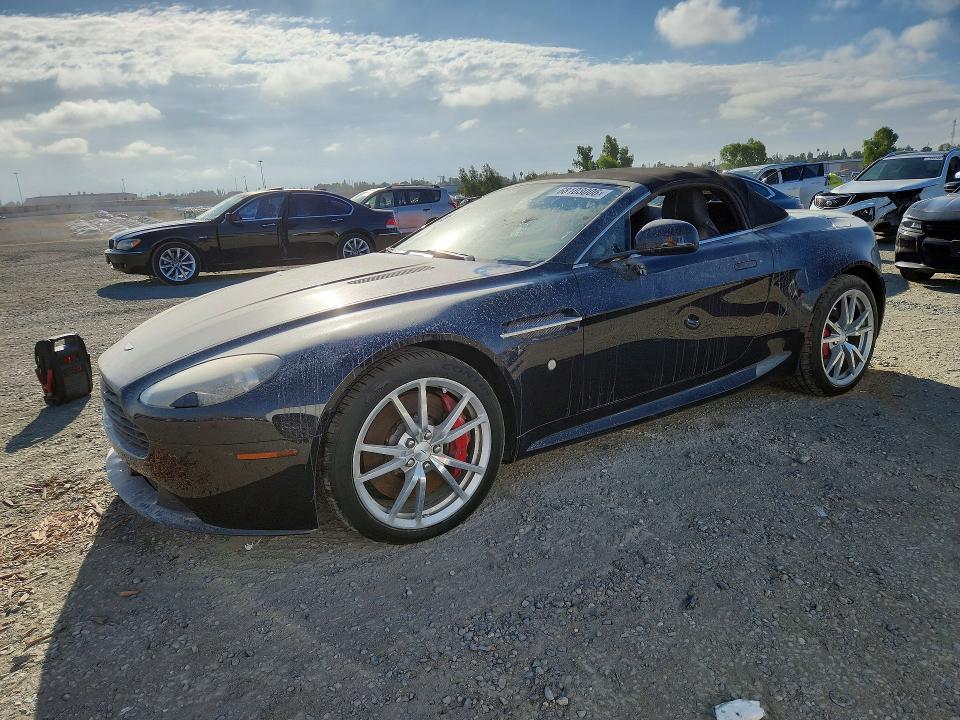 2014 Aston martin VIN SCFEKBBK0EGD18195 COPART salvage auction — VANDALISM, In - Dis/Dlr/Exp Only Clean Title (P), sold $8,900 on 2026-10-20 (photo 1)