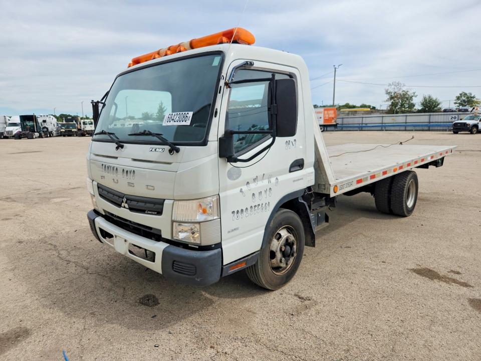 2017 Mitsubishi VIN JL6CRE1A1HK002371 COPART salvage auction — MINOR DENT/SCRATCHES, WI - CERTIFICATE OF TITLE, sold $7,400 on 2026-09-17 (photo 1)