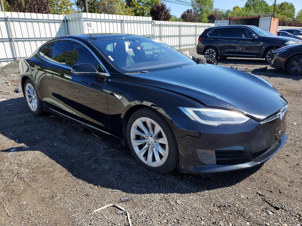 2016 Tesla Model s VIN 5YJSA1E26GF152544 COPART salvage auction — MINOR DENT/SCRATCHES, Salvage Title, sold $6,200 on 2026-10-14 (photo 4)