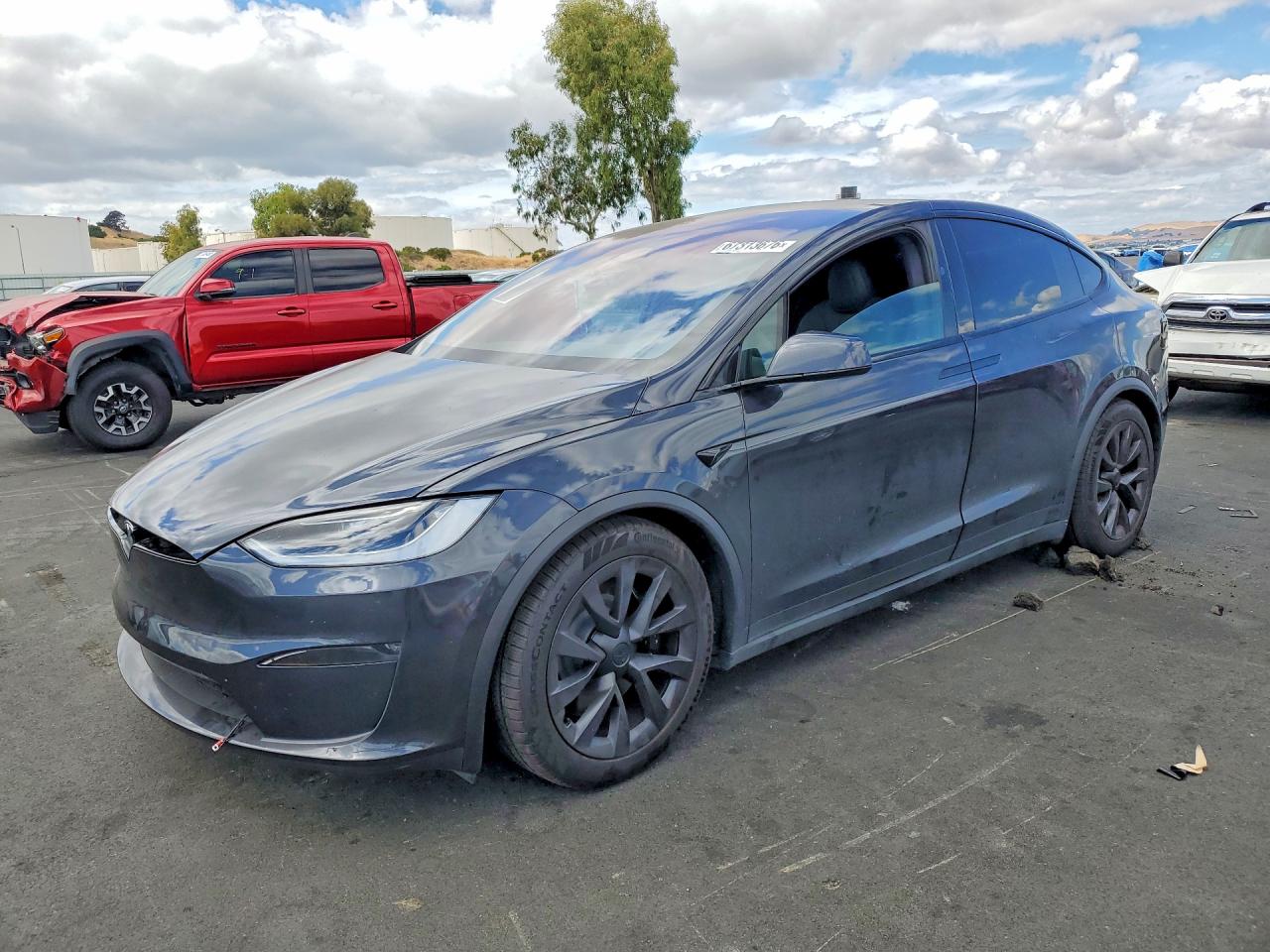 2025 Tesla Model X VIN 7SAXCBE56SF471843 — COPART salvage auction photo