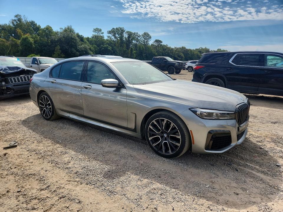 2021 BMW 7er VIN WBA7T4C0XMCE50090 COPART salvage auction — SIDE, IN - CERT OF TITLE-SALVAGE TITLE, sold $20,300 on 2026-10-06 (photo 4)