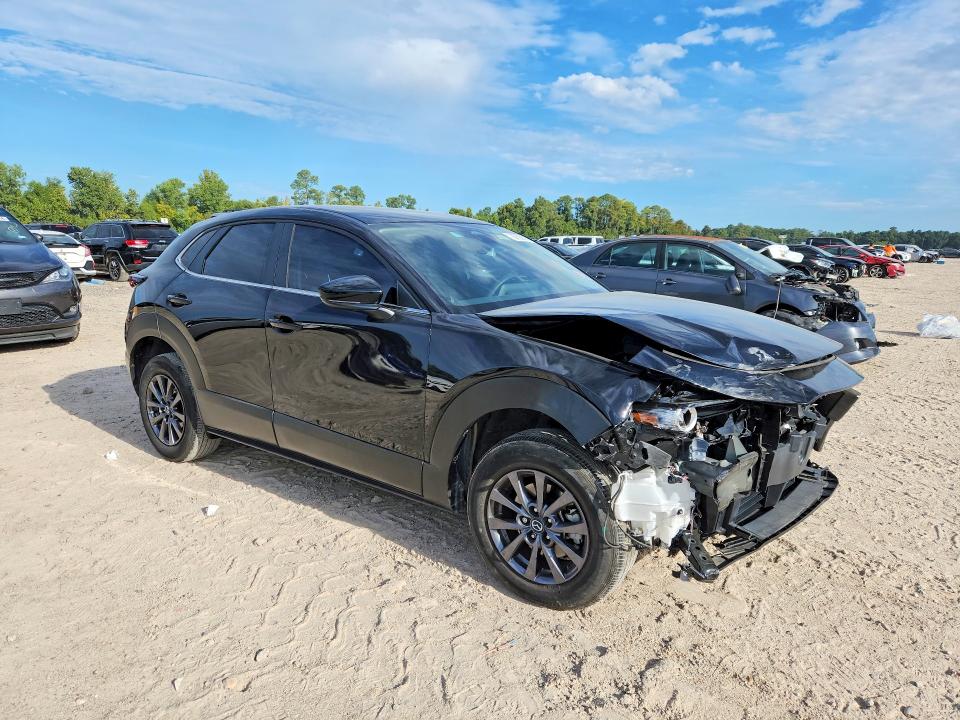 2025 Mazda Cx-30 VIN 3MVDMBAM7SM835336 COPART salvage auction — FRONT END, TX - SALVAGE VEHICLE TITLE (P), sold $4,300 on 2026-09-11 (photo 4)