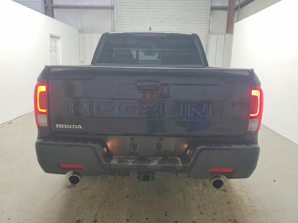 2025 Honda Ridgeline VIN 5FPYK3F50SB038616 COPART salvage auction — MINOR DENT/SCRATCHES, Va - Certificate Of Title, sold $22,500 on 2026-09-14 (photo 6)
