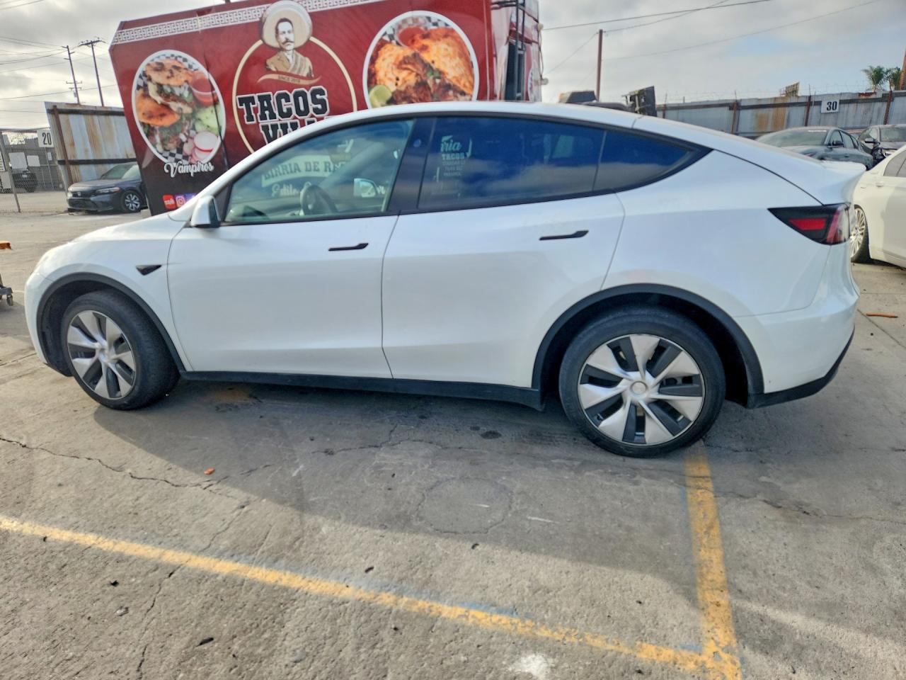 2024 Tesla Model Y VIN 7SAYGDED2RF035707 COPART salvage auction — Front End, CA - SALVAGE CERTIFICATE, sold $16,400 on 2026-10-01 (photo 2)