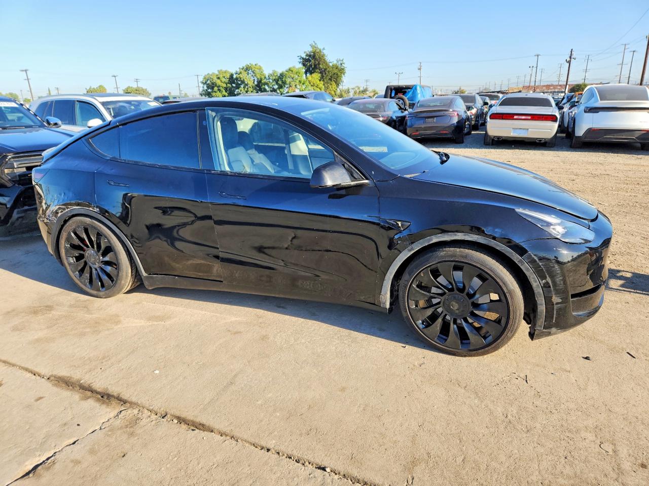 2022 Tesla Model y VIN 7SAYGDEF4NF490568 COPART salvage auction — Front End, CA - SALVAGE CERTIFICATE, sold $13,700 on 2026-09-17 (photo 4)