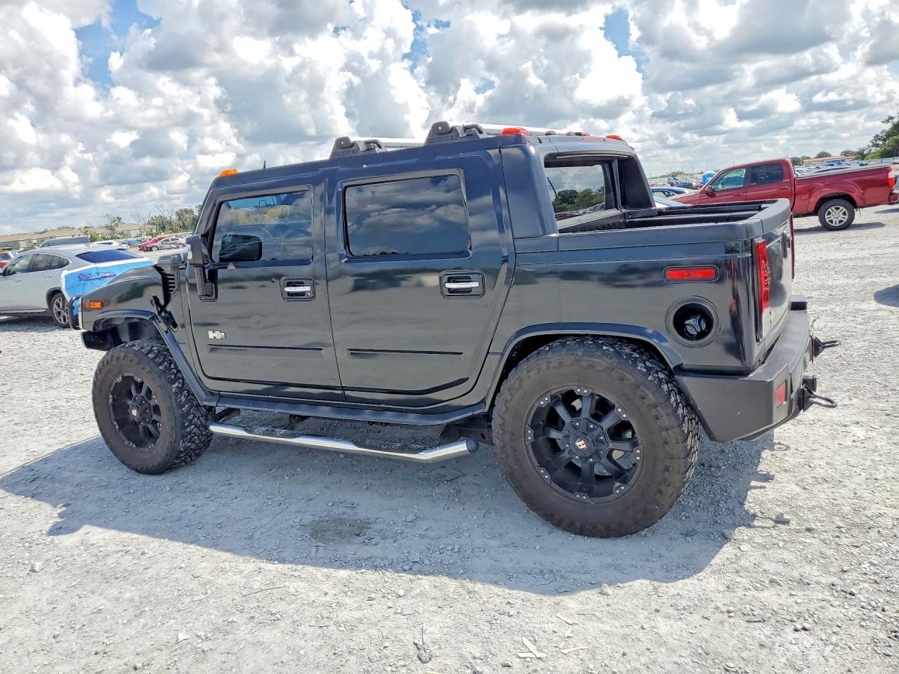 2005 Hummer H2 VIN 5GRGN22UX5H101324 COPART salvage auction — Minor Dent/Scratches, FL - CERTIFICATE OF TITLE, sold $9,800 on 2026-10-09 (photo 2)