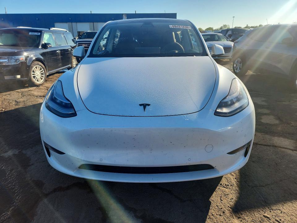 2021 Tesla Model y VIN 5YJYGAEE7MF230151 COPART salvage auction — REAR END, MI, sold $12,400 on 2026-10-16 (photo 5)