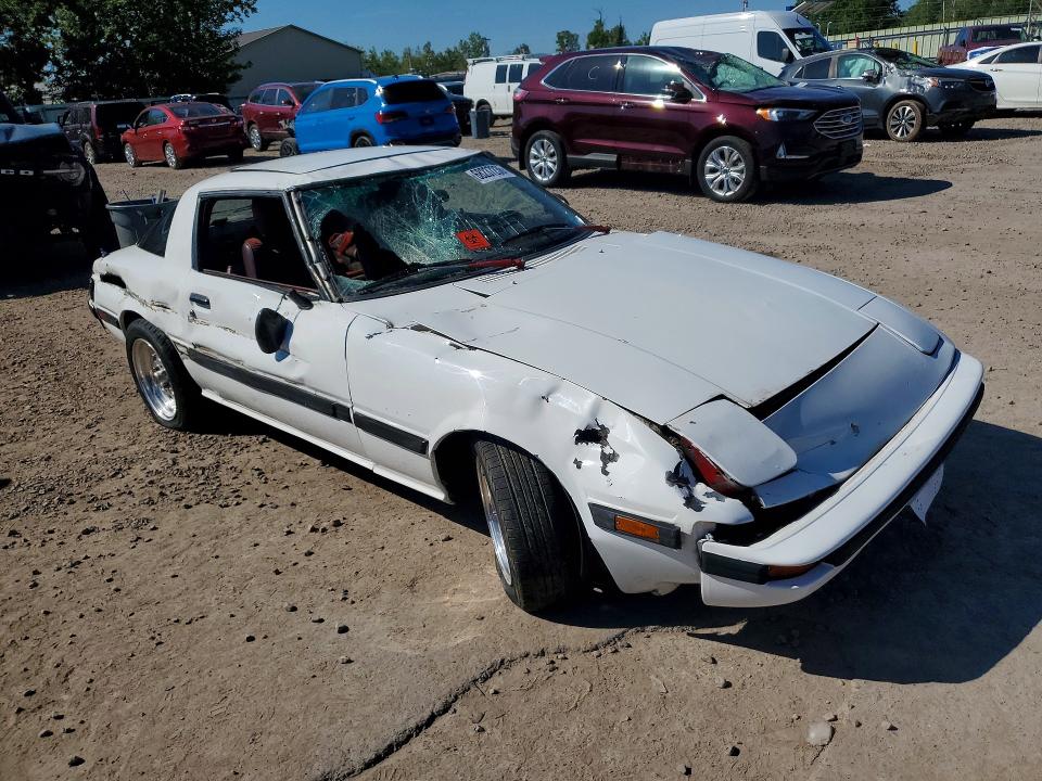 1984 Mazda Rx-7 VIN JM1FB3310E0837784 COPART salvage auction — FRONT END, NY - MV-907A SALVAGE CERTIFICATE, sold $4,350 on 2026-10-07 (photo 4)