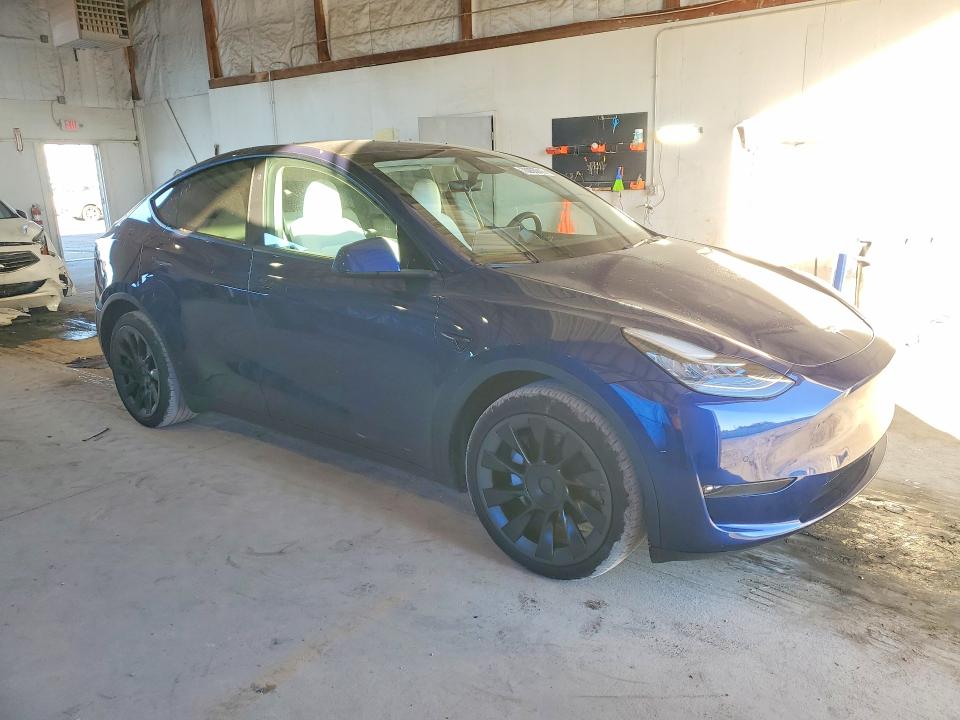 2022 Tesla Model Y VIN 7SAYGAEE9NF486456 COPART salvage auction — NORMAL WEAR, KY - CERTIFICATE OF TITLE, sold $8,900 on 2026-10-05 (photo 4)