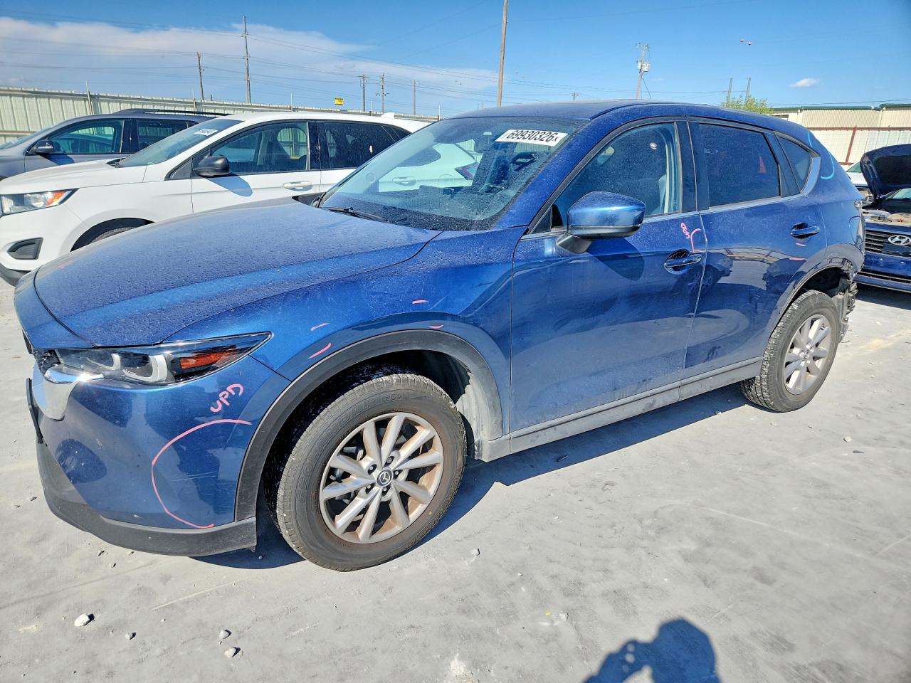 2023 Mazda CX-5 VIN JM3KFBCM0P0131013 — COPART salvage auction photo