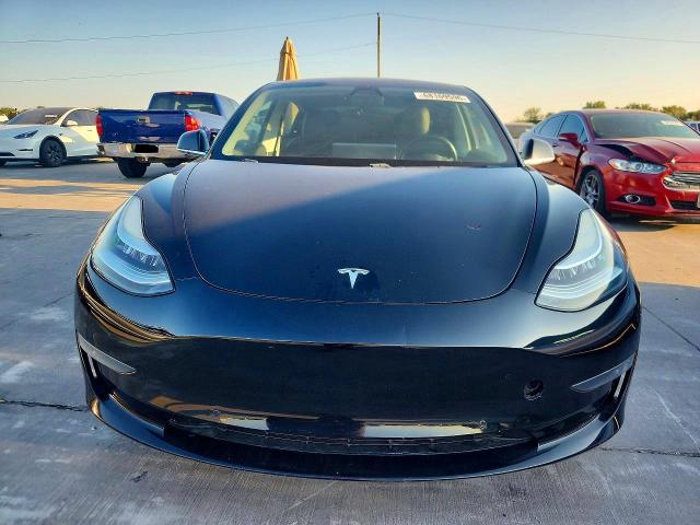 2019 Tesla Model 3 VIN 5YJ3E1EA8KF406375 COPART salvage auction — NORMAL WEAR, TX - CERT OF TITLE-REBUILT SALVAGE (P), sold $6,100 on 2026-09-29 (photo 5)