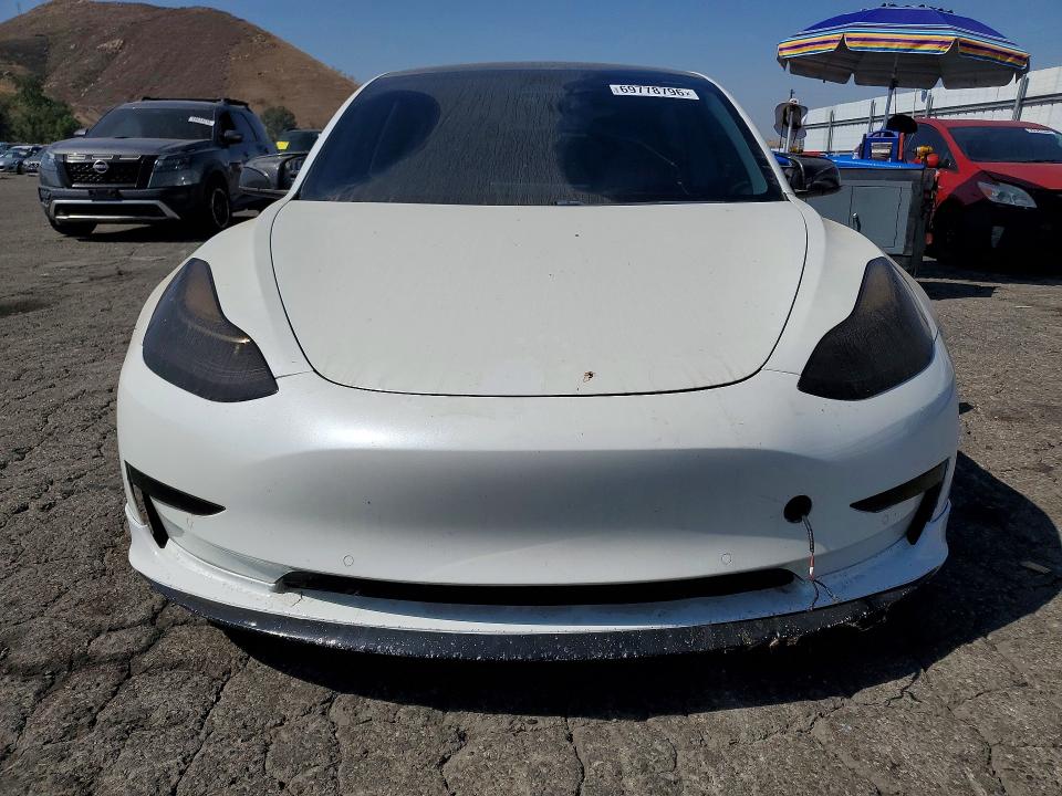 2020 Tesla Model 3 VIN 5YJ3E1EC1LF714233 COPART salvage auction — MINOR DENT/SCRATCHES, Ca - Dis/Dlr/Exp Only Clean Title (P), sold $7,800 on 2026-10-06 (photo 5)