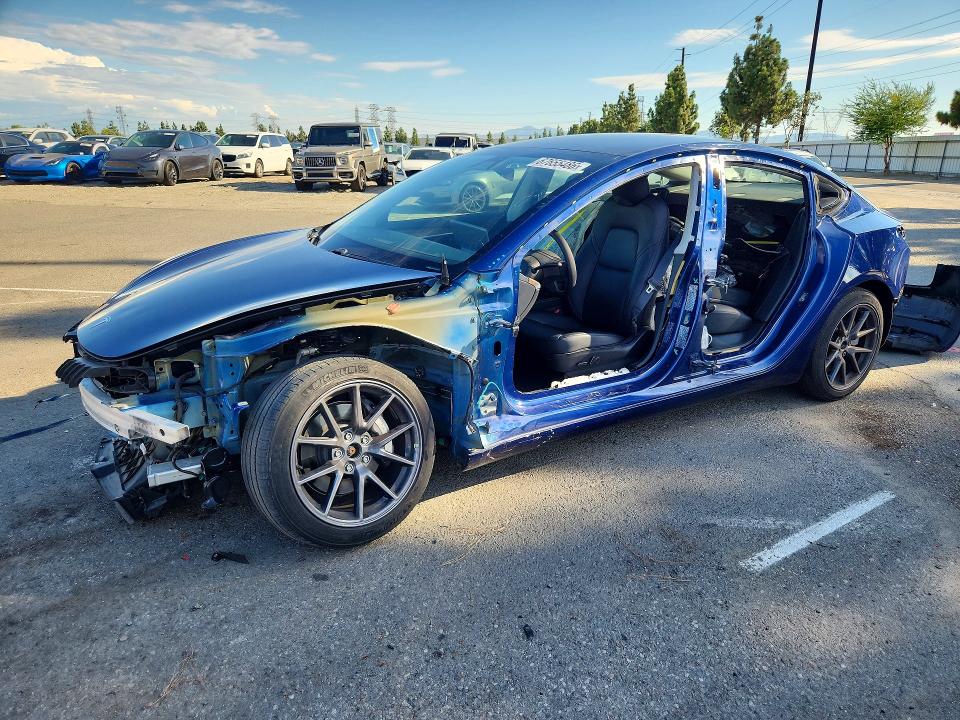 2021 Tesla Model 3 VIN 5YJ3E1EB5MF014921 — COPART salvage auction photo