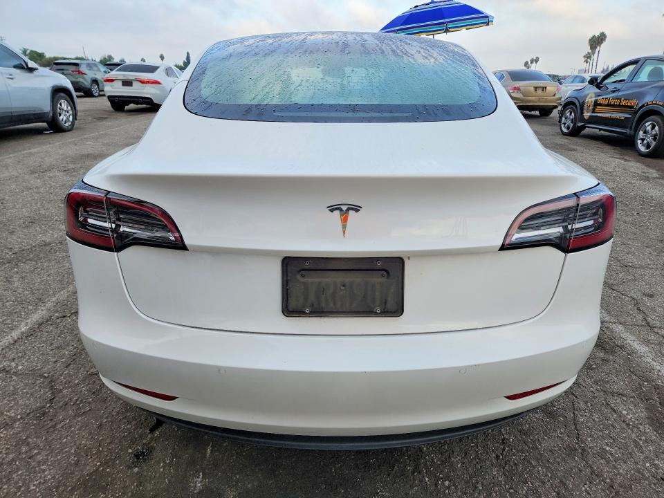 2021 Tesla Model 3 VIN 5YJ3E1EA8MF028836 COPART salvage auction — MINOR DENT/SCRATCHES, CA - DIS/DLR/EXP ONLY CLEAN TITLE, sold $5,700 on 2026-10-07 (photo 6)