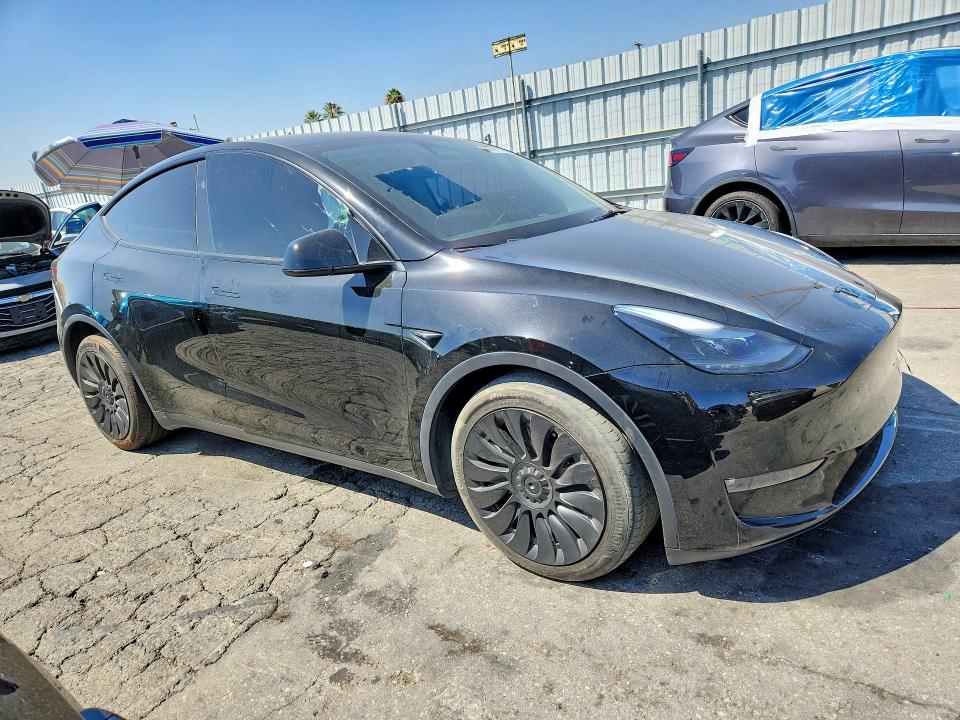 2023 Tesla Model y VIN 7SAYGAEE0PF941889 COPART salvage auction — FRONT END, Ca - Salvage Certificate, sold $10,800 on 2026-10-08 (photo 4)