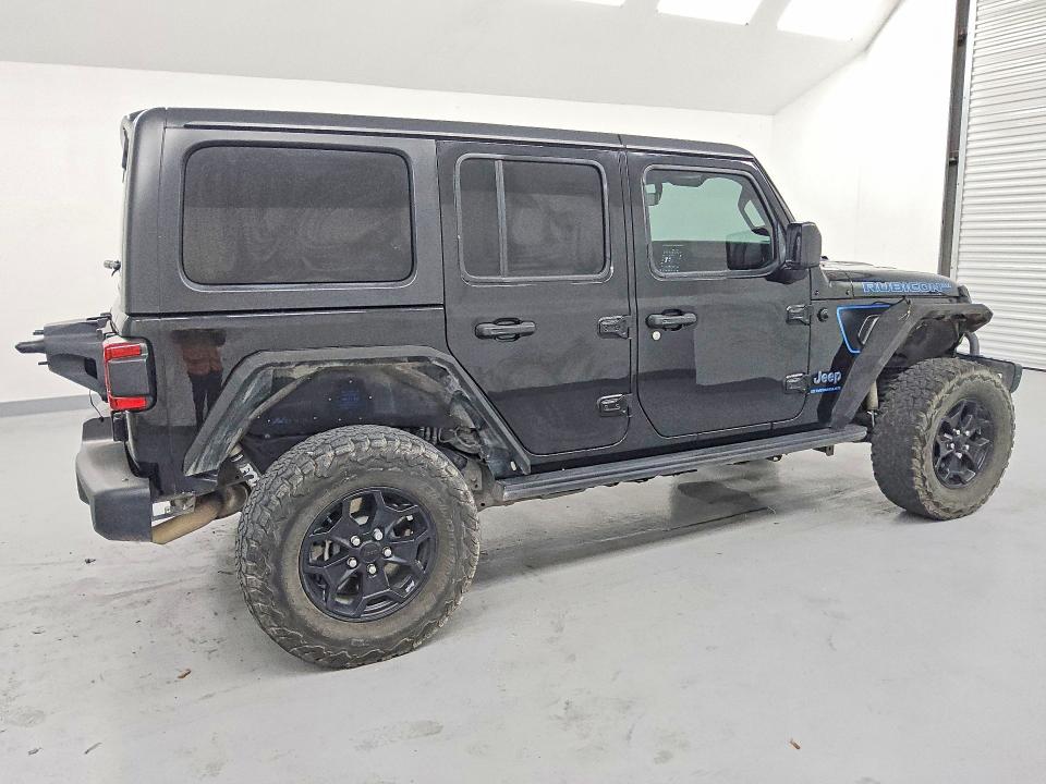 2023 Jeep Wrangler / VIN 1C4JJXR63PW704413 COPART salvage auction — MINOR DENT/SCRATCHES, TX - CERTIFICATE OF TITLE, sold $17,300 on 2026-10-08 (photo 3)