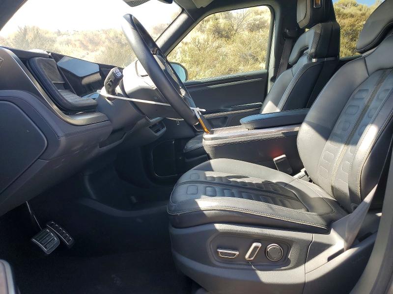 2023 Rivian R1s VIN 7PDSGABL7PN004344 COPART salvage auction — REAR END, Ca - Salvage Certificate, sold $21,400 on 2026-10-22 (photo 7)