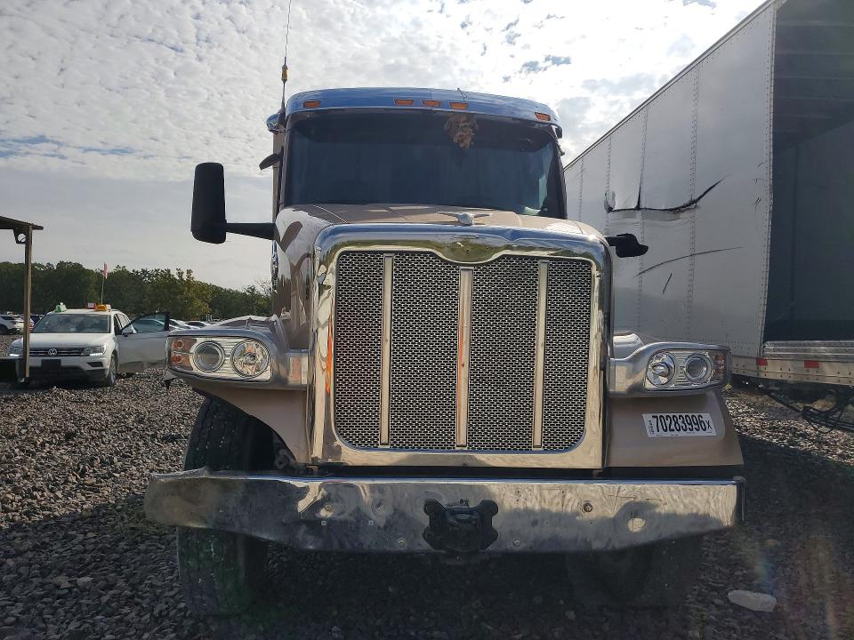 2023 Peterbilt 567 VIN 1XPCDP9X4PD874928 COPART salvage auction — SIDE, NE - CERT OF TITLE-SALVAGE, sold $26,750 on 2026-10-22 (photo 5)