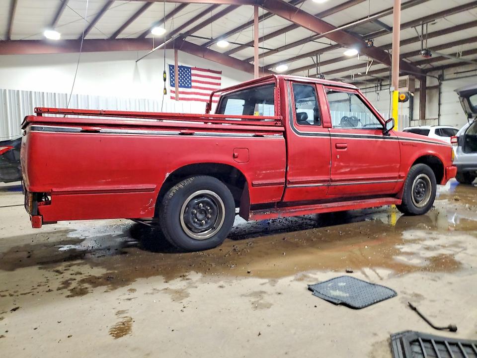 1981 Datsun 720 VIN JN6MD06S6BW022404 COPART salvage auction — SIDE, Pa - Cert Of Salv-R=Reconstructed, sold $750 on 2026-09-29 (photo 3)