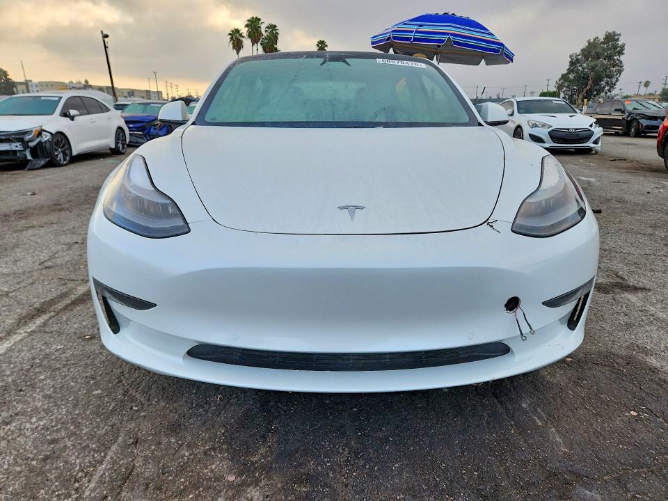 2021 Tesla Model 3 VIN 5YJ3E1EA8MF028836 COPART salvage auction — MINOR DENT/SCRATCHES, CA - DIS/DLR/EXP ONLY CLEAN TITLE, sold $5,700 on 2026-10-07 (photo 5)
