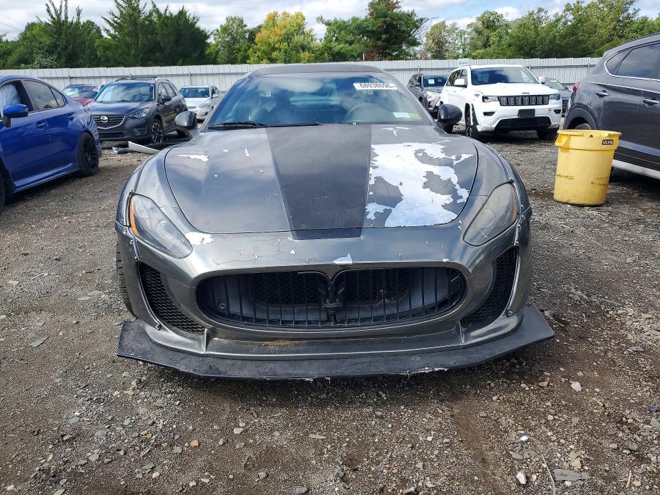 2012 Maserati Granturismo VIN ZAM45KLA6C0064837 COPART salvage auction — MINOR DENT/SCRATCHES, NY - CERT OF TITLE-REBUILT SALVAGE, sold $8,400 on 2026-09-25 (photo 5)