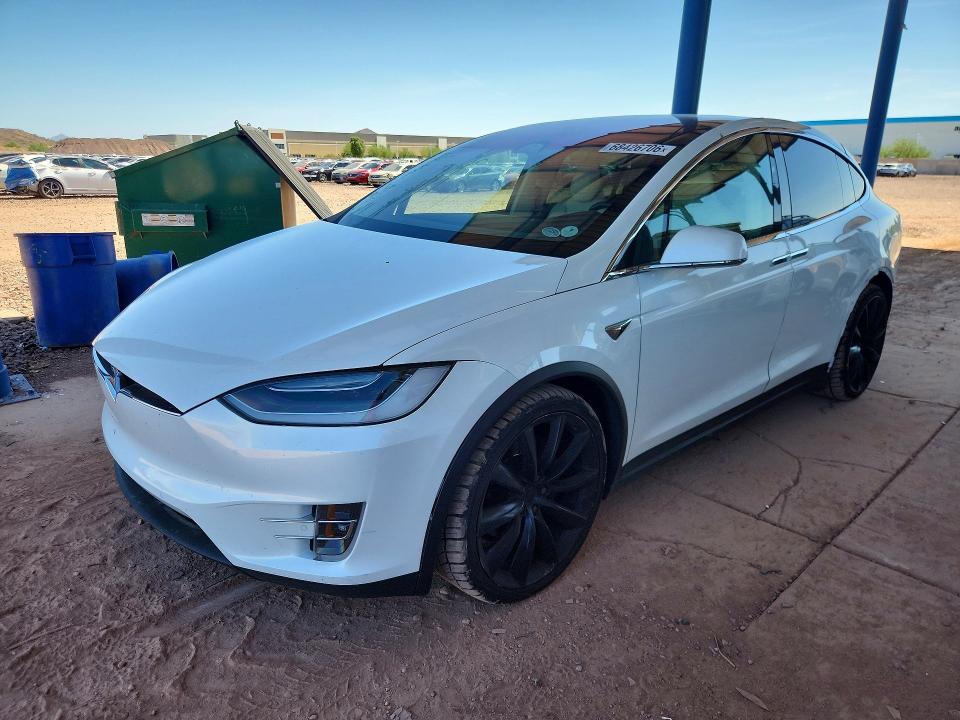 2018 Tesla Model x VIN 5YJXCBE23JF140588 — COPART salvage auction photo