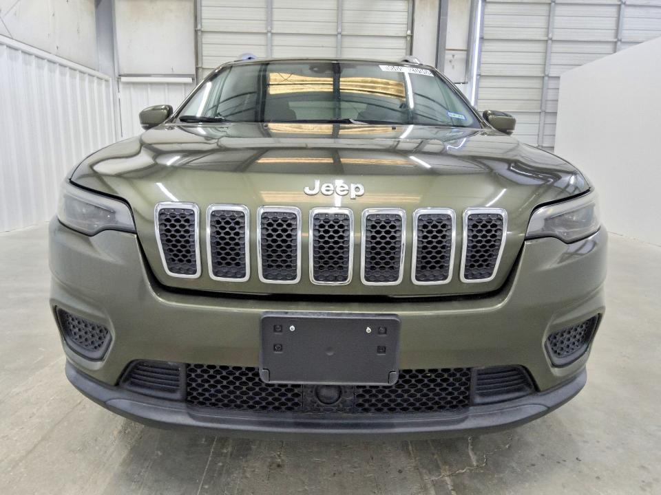 2021 Jeep Cherokee VIN 1C4PJLCB2MD187766 COPART salvage auction — MECHANICAL, TX - CERTIFICATE OF TITLE, sold $10,600 on 2026-10-08 (photo 5)